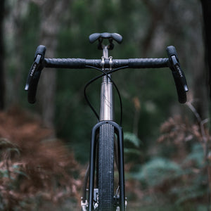 Titanium gravel bike in Australian bush